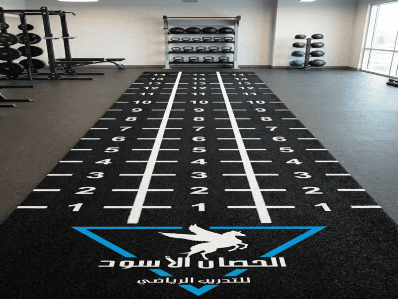 Copper grounding tape being installed under gym flooring